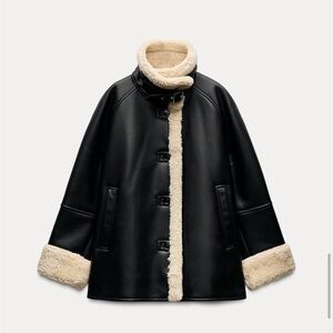 Elegant Black Coat with Cream Accents